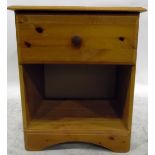 Pine bedside cupboard with frieze drawer and open shelf below,