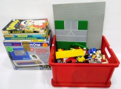 Talking Lesson One keyboard, a Lego red bucket and various pieces and five annuals including Dandy,
