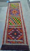 Suzni Kelim runner with geometric trelliswork and lozenge decoration, in multi-colours,