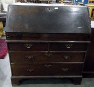 19th century oak bureau with fall-front enclosing drawers and pigeonholes,