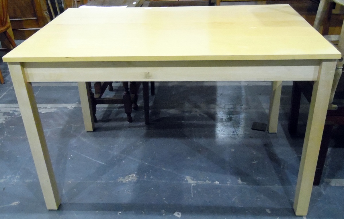 Pale wood rectangular-top table, on square legs,