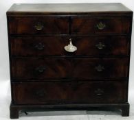 Georgian style walnut veneer chest of two short and three long graduated drawers, on bracket feet,