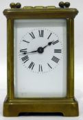 Late 19th/early 20th century brass carriage timepiece with plain enamel dial, Roman numerals,