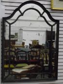 19th century ebony style wall mirror with gilt highlights, arched top,