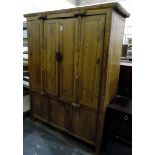 Antique pine Chinese travelling food cupboard with central cupboard enclosing shelves and drawers,