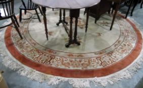 Large Chinese circular wool rug with dragon and flaming pearls to centre, of ivory field,