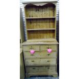 Pine chest of two short and three long drawers, on bracket feet, with brass handles,
