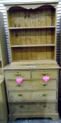 Pine chest of two short and three long drawers, on bracket feet, with brass handles,