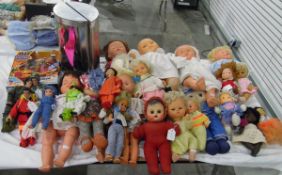 Large quantity of modern dolls to include Action Man, Barbie, modern baby dolls,