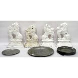 Pair of 19th century cast iron door stops, lions rampant, painted white and two others,
