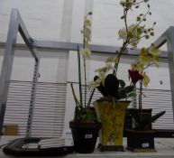 Three vases with faux flowers,