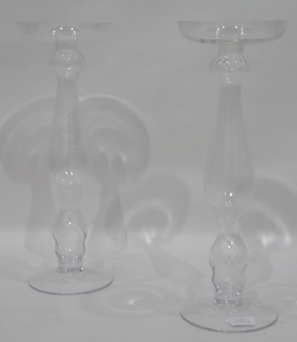 Pair of modern glass baluster-shaped pillar candlesticks of spirally wrythen form,