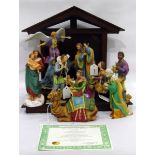 Franklin Mint and tinted bisque nativity group,