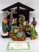 Franklin Mint and tinted bisque nativity group,