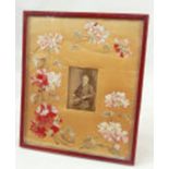 Large red leather gilt tooled photograph frame, with an embroidered and silk applique flowers,