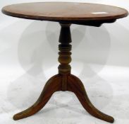 Circular pine pedestal table on tripod supports,