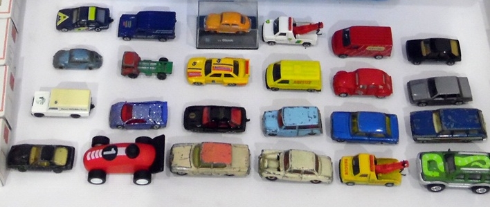 A small quantity of cars to include Corgi,