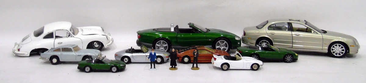 Quantity of James Bond cars including Aston Martin DB5, Jaguar XKR in two sizes,