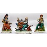Collection of tinted bisque Capodimonte figures including organ grinder and monkey limited edition