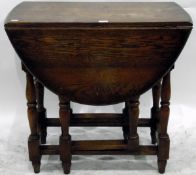 An oak gateleg table