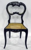 Victorian gilded and mother-of-pearl inlaid papier mache chair with cane seat and vine decoration