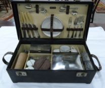 Brexton black cased picnic hamper with silver plated flatware, ceramic cups and saucers,