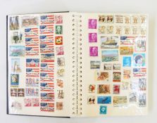 Four stamp albums with world, mainly used selection,