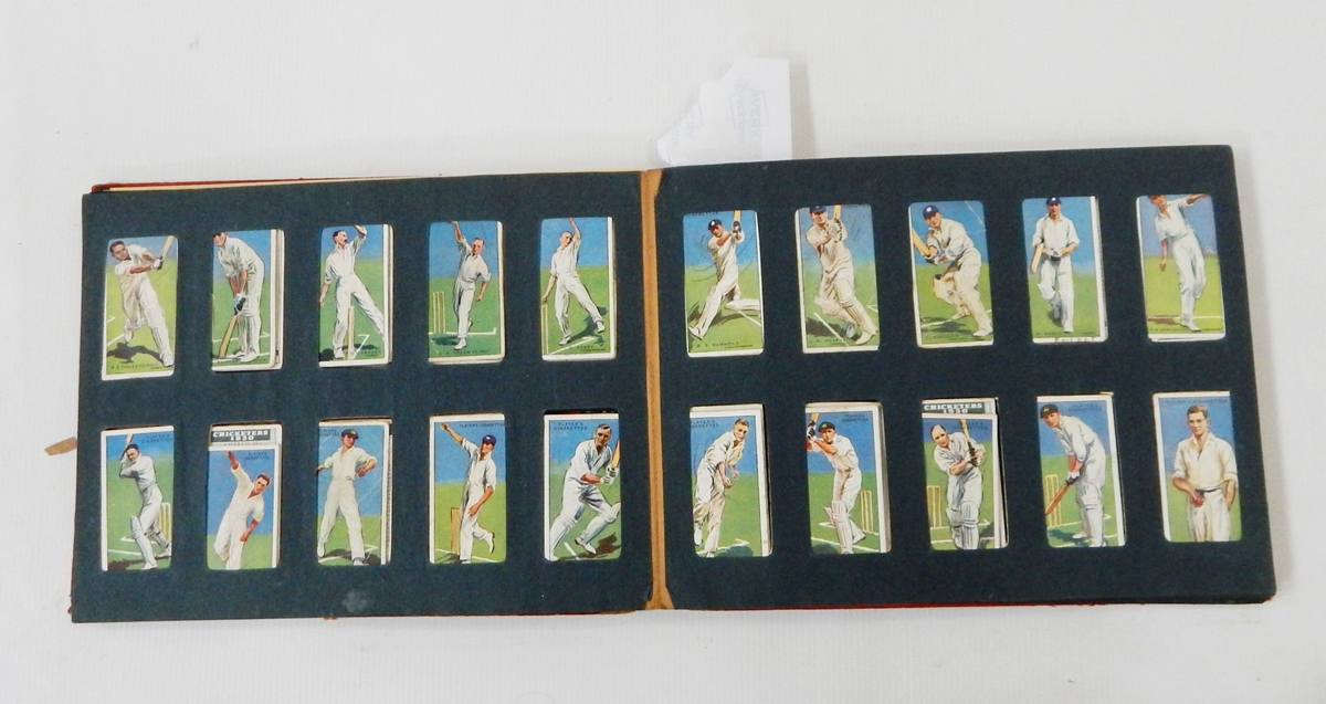Album of cigarette cards to include Players 'Cricketers', Players 'Naval Dress',