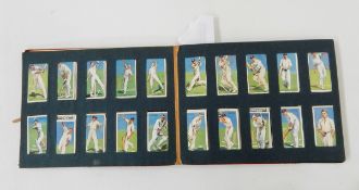 Album of cigarette cards to include Players 'Cricketers', Players 'Naval Dress',