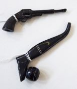 Two miniature novelty pipes/cigarette holders, one formed as a football boot with football,