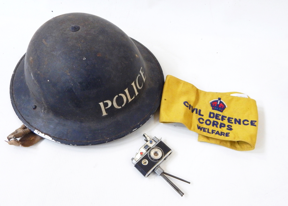 WWII Brodie style helmet with POLICE on the front,