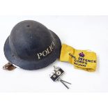 WWII Brodie style helmet with POLICE on the front,