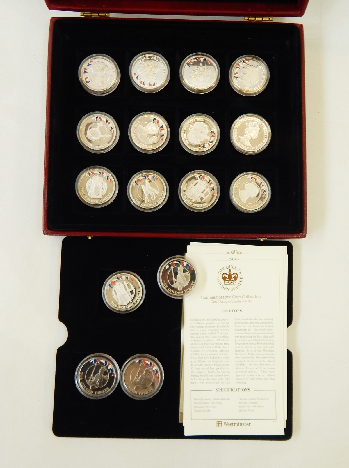 13 silver crowns commemorating 2002, 28.28 grams and three cupro nickel.