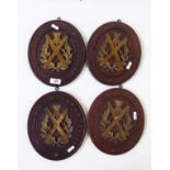 Four brass and mahogany wall plaques with Scots Guard motto 'NEMO ME IMPUNE LACESSIT'