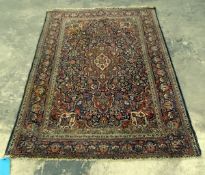 Antique Kashan wool carpet of Persian design,