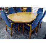 Oak octagonal extending boardroom/dining table on block style pedestal,
