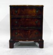 Georgian style reproduction mahogany serpentine-front chest of three graduated drawers,