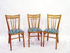 Set of four kitchen chairs with plastic seats,