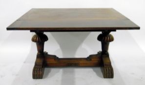 Oak draw-leaf dining table on turned bulbous twin-pedestal supports, united by central stretcher,