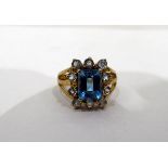 9ct gold, aquamarine and topaz ring, the central stepped cut topaz 7mm x 9mm,