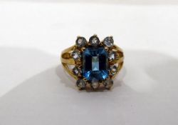 9ct gold, aquamarine and topaz ring, the central stepped cut topaz 7mm x 9mm,