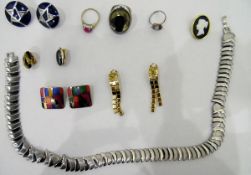 Quantity of costume jewellery to include bangles, beaded necklaces, clip-on earrings,