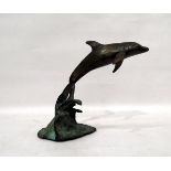 R Jones (20th century school) bronze model dolphin on verdigris bronze wave-pattern base,