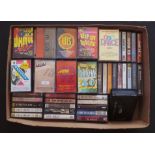 Quantity of approximately 75 cassette tapes along with Alba CP-69 Walkman cassette player with