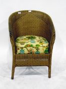 Lloyd Loom style gilt-coloured tub chair with upholstered seat
