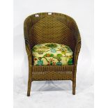 Lloyd Loom style gilt-coloured tub chair with upholstered seat