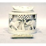 Early 20th century ivory lidded box with carved relief of animals, including elephant, lion,