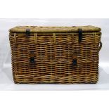 Large two-handled wicker basket with leather straps