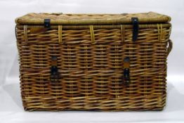 Large two-handled wicker basket with leather straps