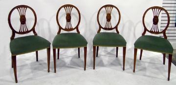 Set of four oval backed dining chairs with green upholstered seats,